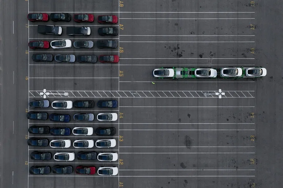 A drone view shows Tesla electric vehicles waiting for shipment outside the Tesla gigafactory in Austin, Texas, US, on 2 May 2025. (Eli Hartman/Reuters)