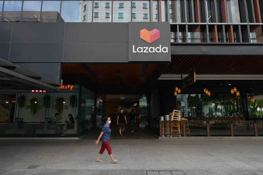 People walk past the Lazada building in Singapore on 9 January 2023. (SPH Media)