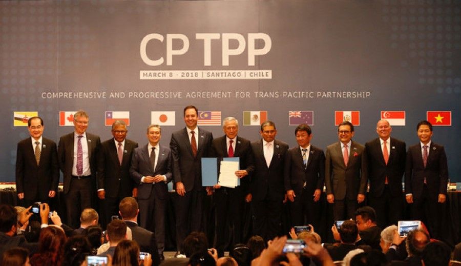 Members of Trans-Pacific Partnership trade deal pose for an official picture after the signing agreement ceremony in Santiago, 2018. (Internet/SPH)