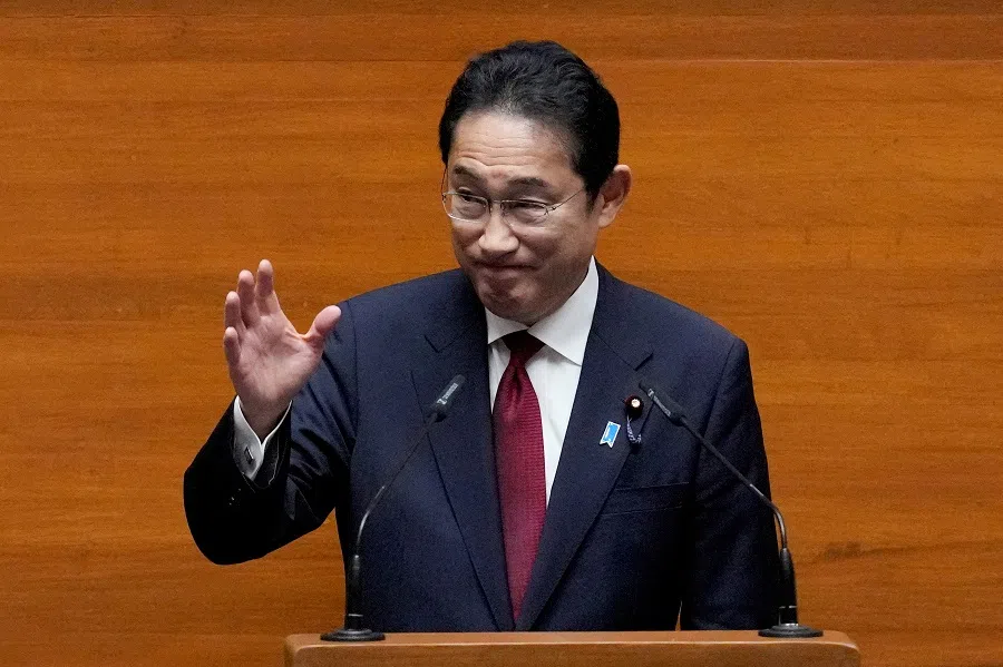Japanese Prime Minister Fumio Kishida gestures as he delivers his speech at the House of Representatives in Quezon City, Philippines, on 4 November 2023. (Aaron Favila/Reuters)