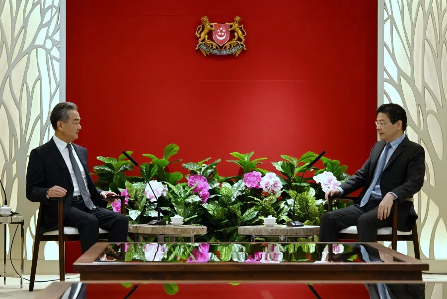 Communist Party of China (CPC) Politburo member, Director of the Office of the Central Commission for Foreign Affairs (CFAO) and Foreign Minister (FM) Wang Yi call on DPM Lawrence Wong, 11 August 2023. (SPH Media)
