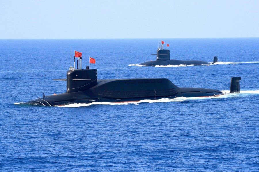 A nuclear-powered Type 094A Jin-class ballistic missile submarine of the Chinese People's Liberation Army (PLA) Navy is seen during a military display in the South China Sea on 12 April 2018. (Stringer/Reuters)