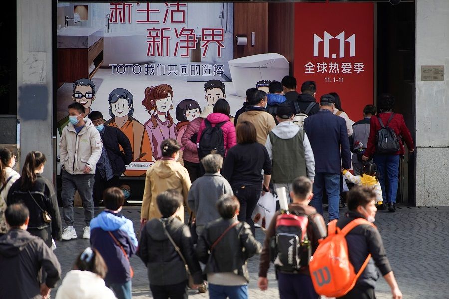 An advertisement to promote JD.com's Singles' Day shopping festival is pictured in Shanghai, China, 11 November 2021. (Aly Song/Reuters)