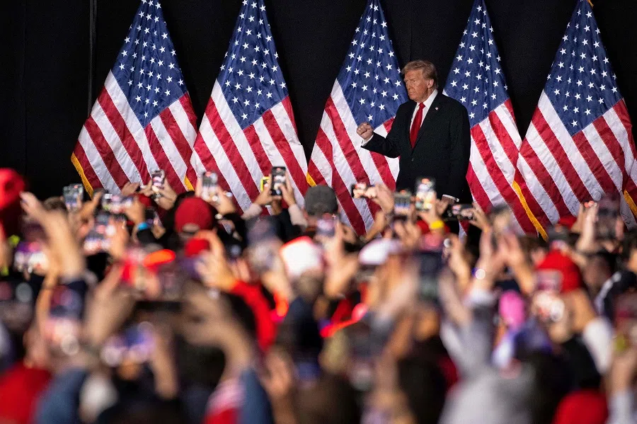 US President-elect Donald Trump arrives to speak at a campaign rally at Macomb Community College in Warren, Michigan, on 1 November 2024.