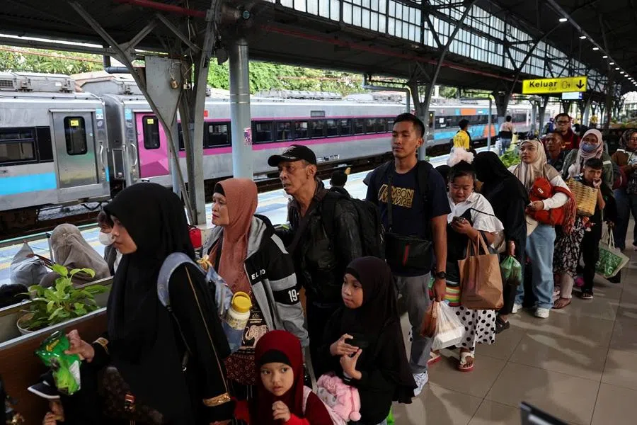 Passengers queue at Pasar Senen station in Jakarta, Indonesia, 16 March 2026.