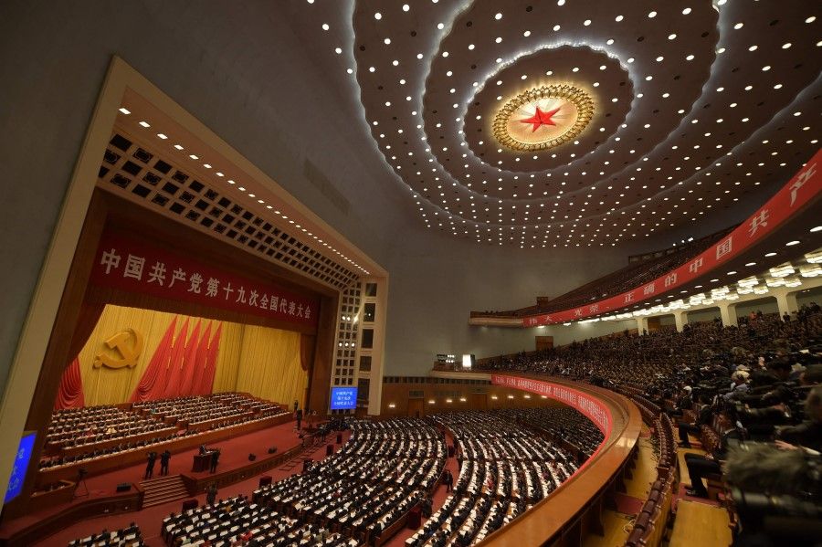 In this file photo taken on 18 October 2017, a general view shows delegates attending the opening of the 19th Communist Party Congress at the Great Hall of the People in Beijing. (Nicolas Asfouri/AFP)