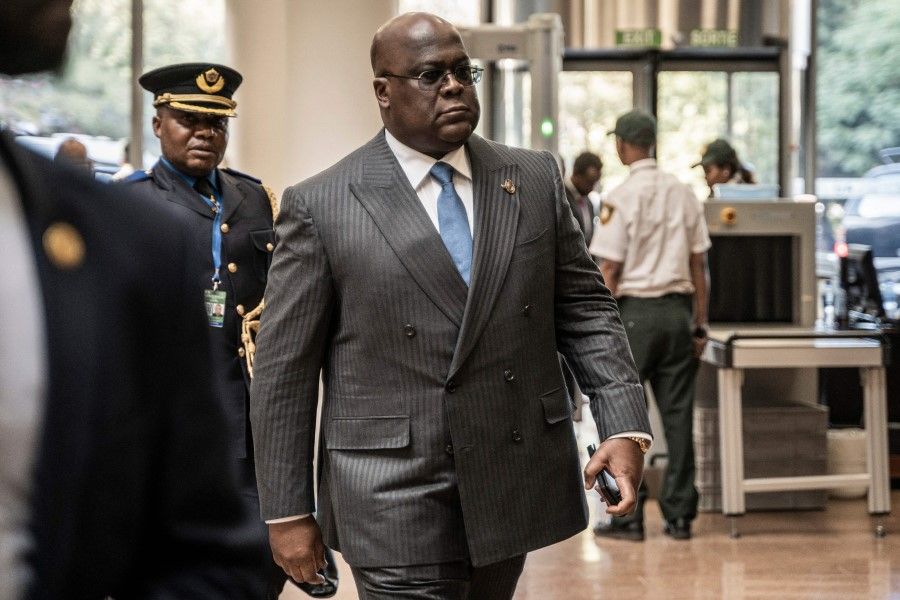 President of the Democratic Republic of the Congo Felix Tshisekedi (centre) arrives to attend a mini-summit on Peace and Security in eastern Democratic Republic of Congo (DRC) on the sidelines of the 36th Ordinary Session of the Assembly of the African Union (AU) in Addis Ababa on 17 February 2023. (Amanuel Sileshi/AFP)