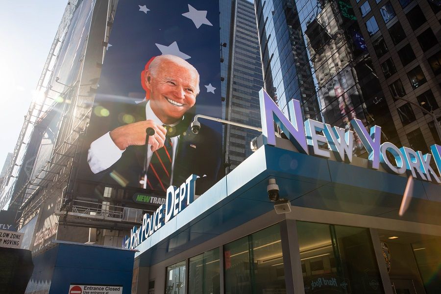 An image of US President-elect Joe Biden on a screen in the Times Square area of New York, US, on 9 November 2020. (Michael Nagle/Bloomberg)
