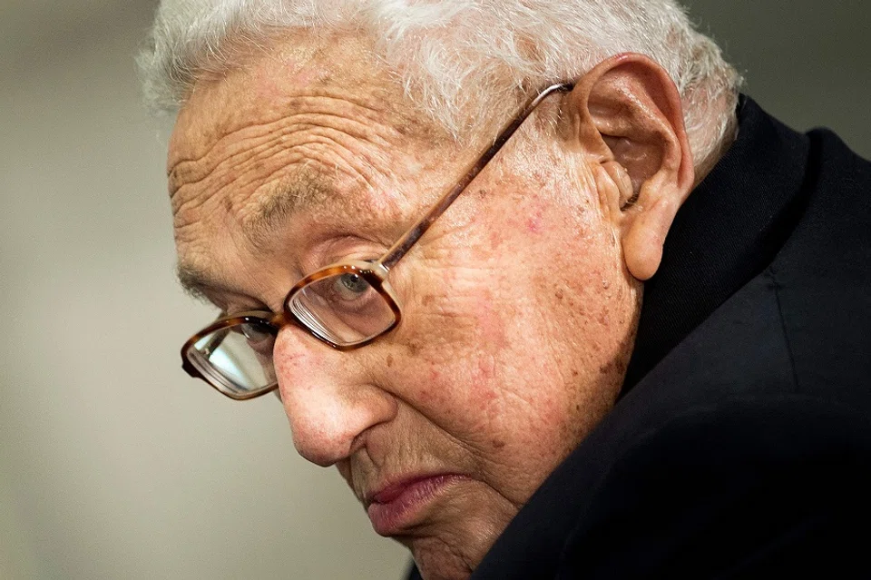 Former US Secretary of State Henry Kissinger listens while he is introduced at a ceremony honouring his diplomatic career on 9 May 2016 at the Pentagon in Washington, DC. (Brendan Smialowski/AFP)