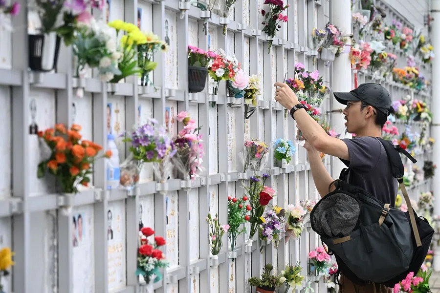 A man visits the resting place of a relative at the Pok Fu Lam cemetery during the Chung Yeung Festival, also known as the Double Ninth Festival, where people honour their ancestors by tending to their graves in Hong Kong on 29 October 2025.
