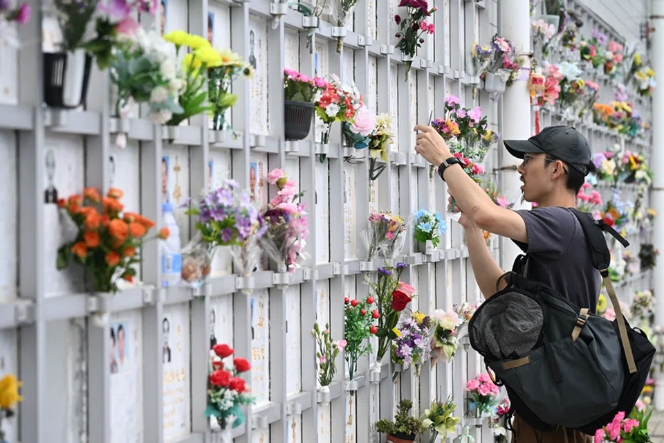 A man visits the resting place of a relative at the Pok Fu Lam cemetery during the Chung Yeung Festival, also known as the Double Ninth Festival, where people honour their ancestors by tending to their graves in Hong Kong on 29 October 2025. (Peter Parks/AFP)