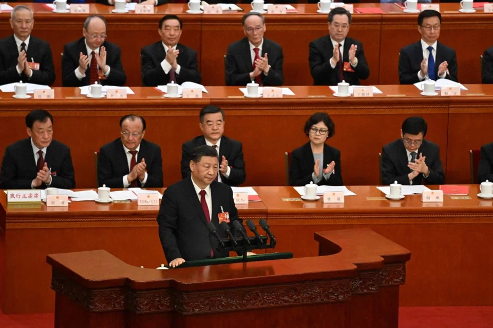 This file photo taken on 13 March 2023 shows China’s President Xi Jinping speaking during the closing session of the National People’s Congress (NPC) at the Great Hall of the People in Beijing. (Noel Celis/AFP)