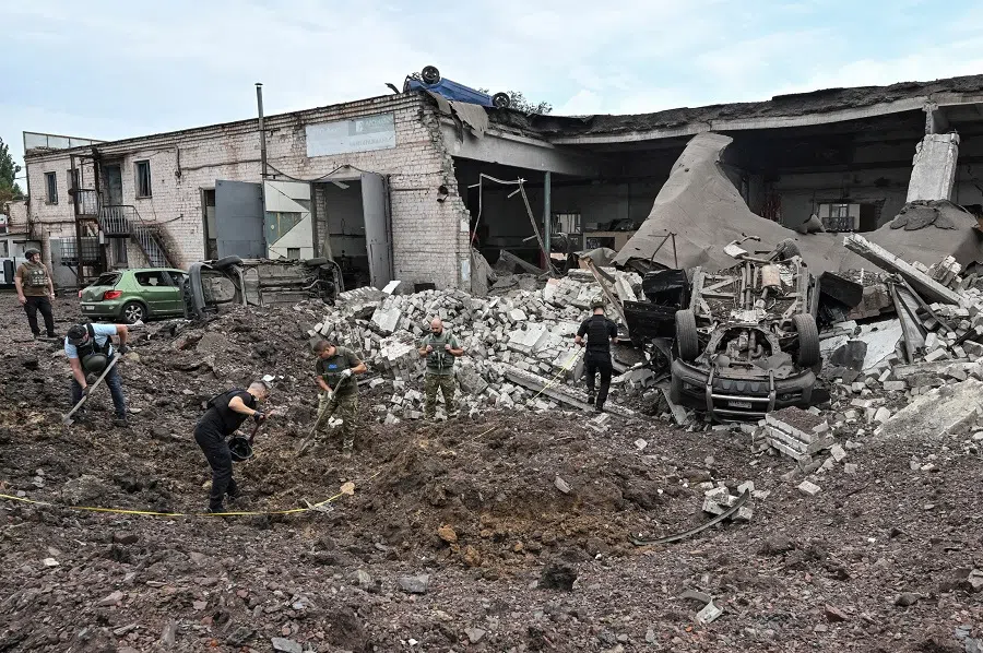 Police experts work at a site of a Russian missile strike, amid Russia’s attack on Ukraine, in Kryvyi Rih, Ukraine, on 28 August 2024. (Andrii Gorb/Reuters)