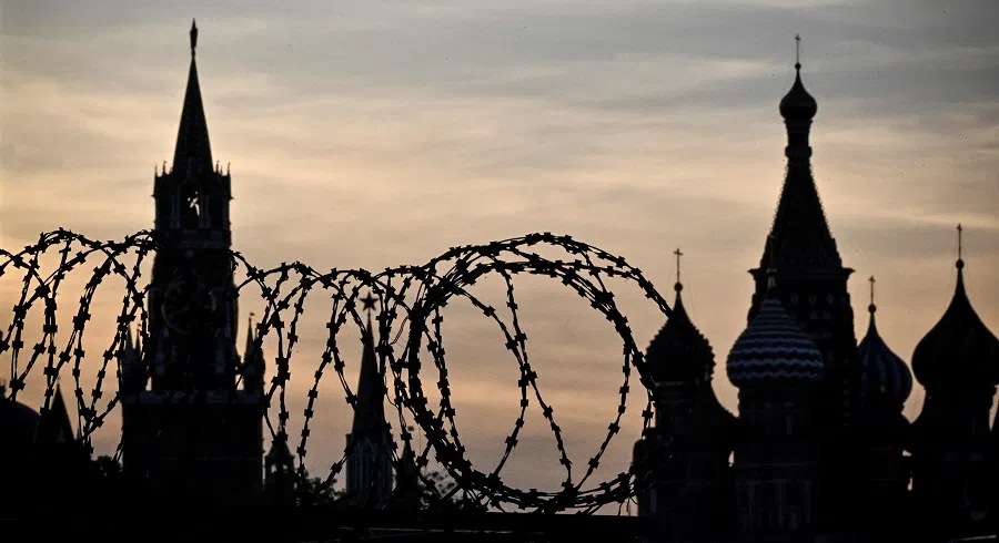 This photograph shows a view of the Kremlin taken on 17 May 2023 through the barbed wire of a municipal technical facility in Moscow. (Alexander Nemenov/AFP)