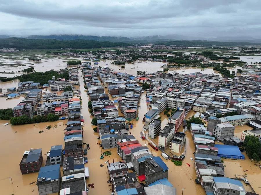 A drone view shows flooding in Pingshan village after heavy rainfall brought by Typhoon Maysak, in Hengzhou, Guangxi Zhuang Autonomous Region, China, on 6 July 2026.