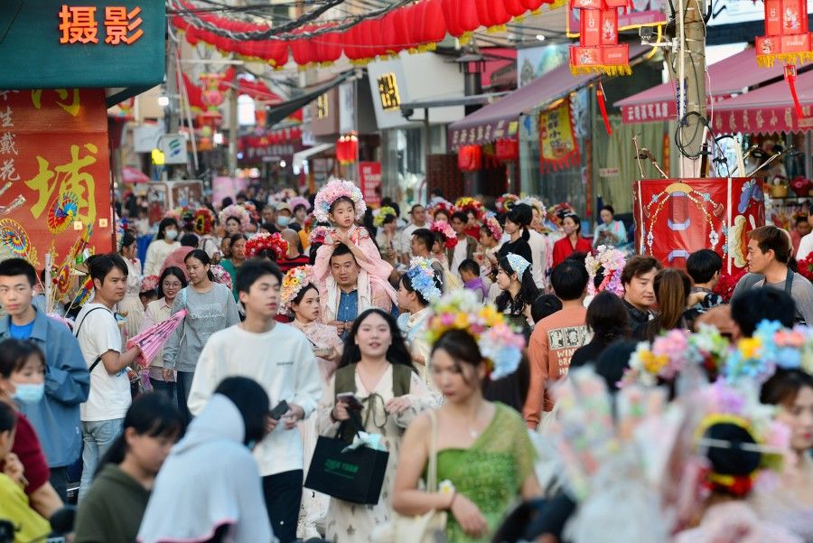A crowded street during the Spring Festival in Xunpu village, Fujian province, on 21 February 2024.