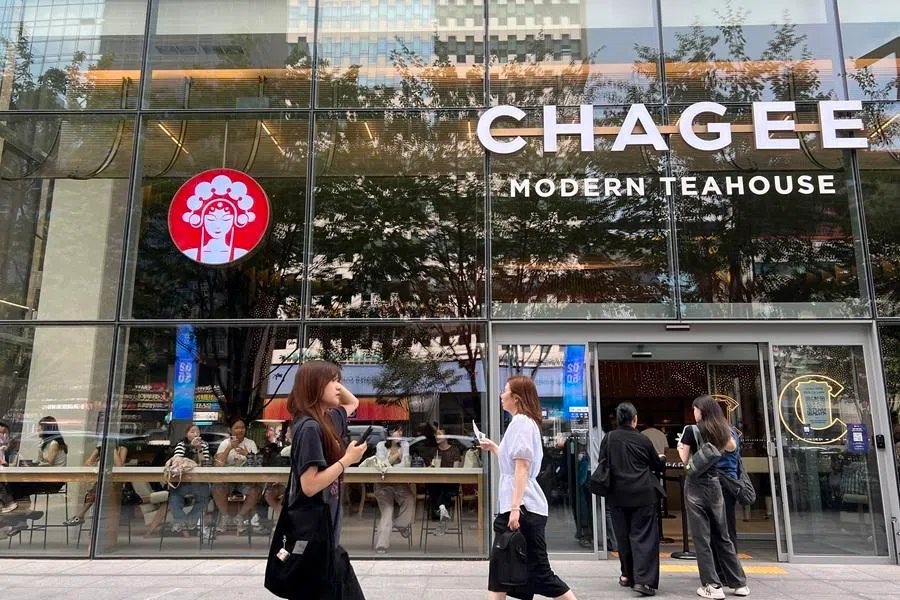 People walking in front of Chagee in Seoul, South Korea, in July 2026. Since entering the South Korean market in late April, Chagee has opened six outlets in Seoul’s prime shopping districts.