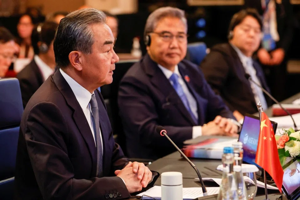 Chinese Communist Party's foreign policy chief Wang Yi speaks as Japan's Foreign Minister Yoshimasa Hayashi and South Korea's Foreign Minister Park Jin look on during the Association of Southeast Asian Nations (ASEAN) Plus Three Foreign Ministers' Meeting in Jakarta, Indonesia, 13 July 2023. (Mast Irham/Pool via Reuters)