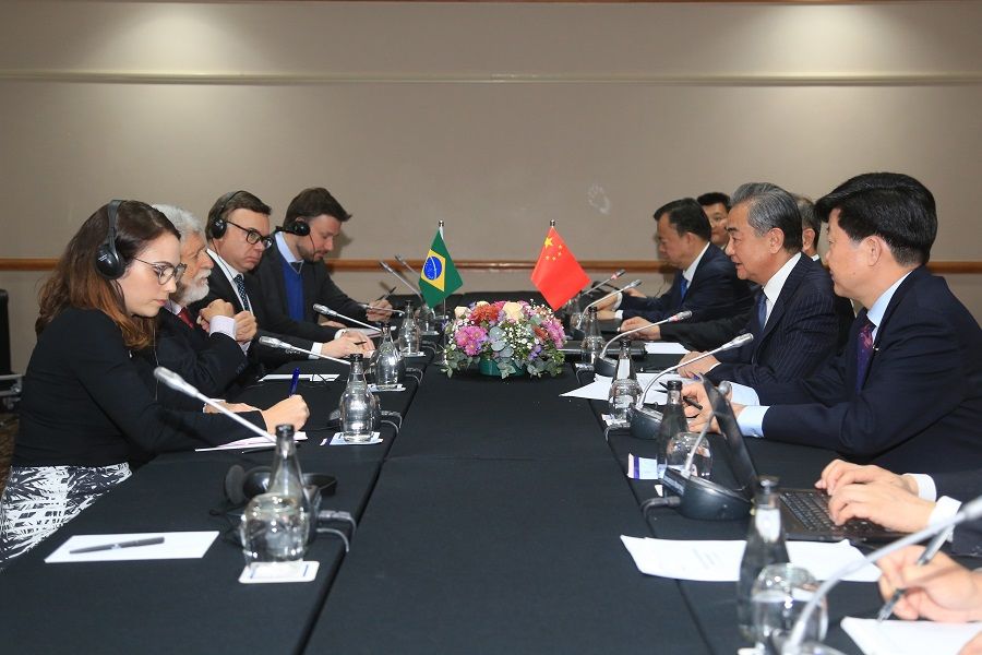 Director of the Office of the Central Commission for Foreign Affairs Wang Yi meets with secretary of Iran's Supreme National Security Council Ali Akbar Ahmadian in Johannesburg, South Africa, on 24 July 2023. (CNS)
