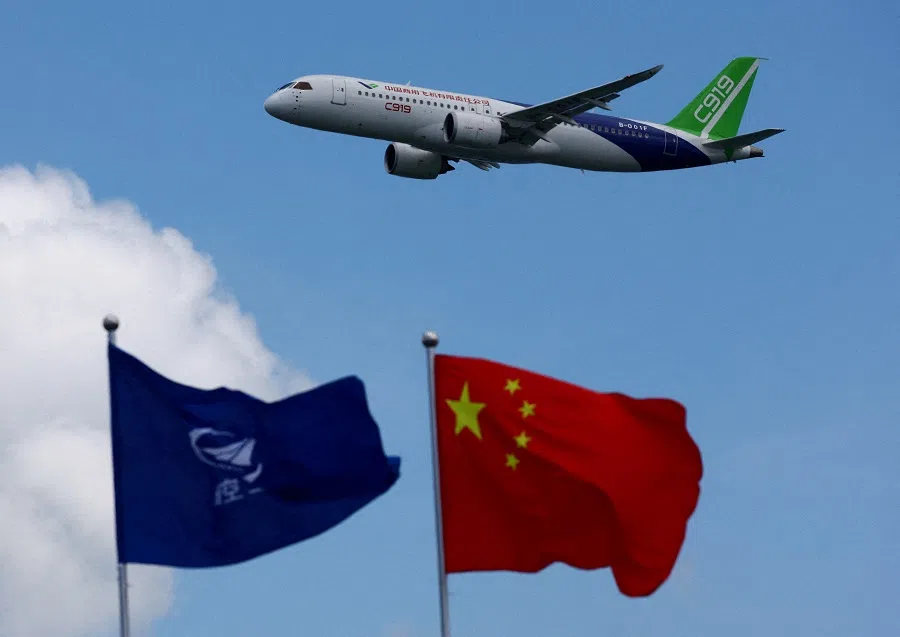 A COMAC C919 flies during an aerial display at the Singapore Airshow at Changi Exhibition Centre, in Singapore on 20 February 2024.