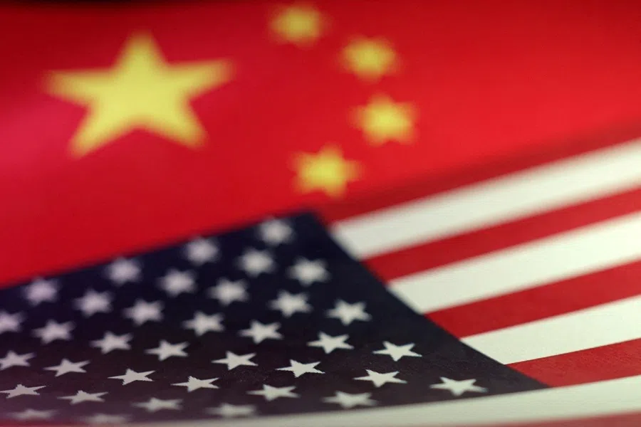 US and Chinese flags are seen in this illustration created on 10 April 2025.