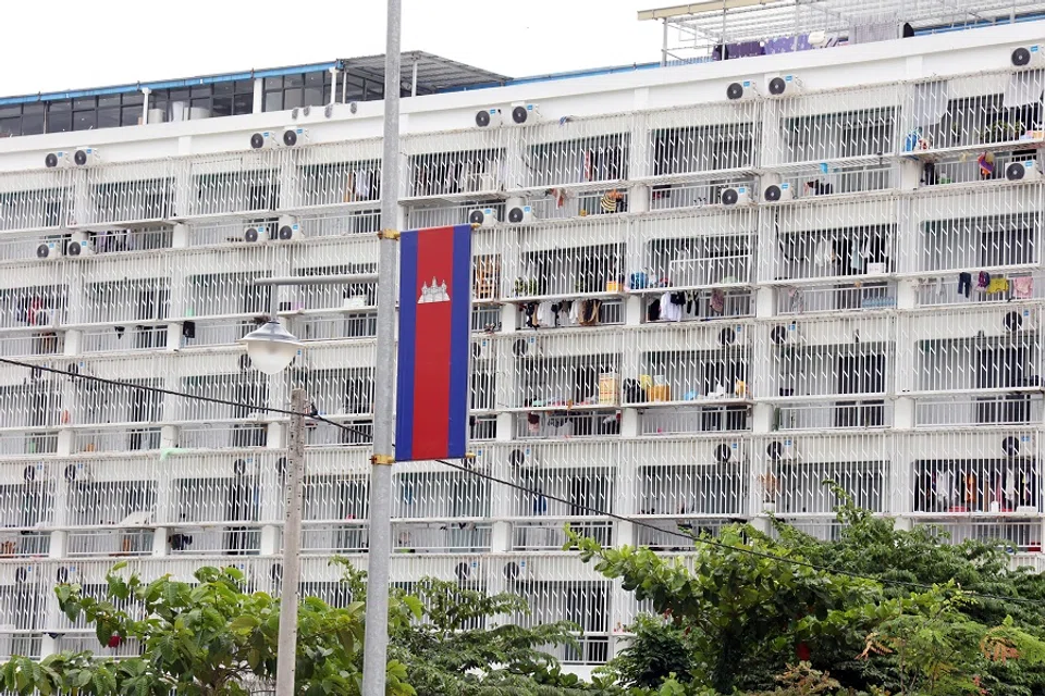 Balconies at a compound in Sihanoukville are covered with iron grilles to prevent escapes.