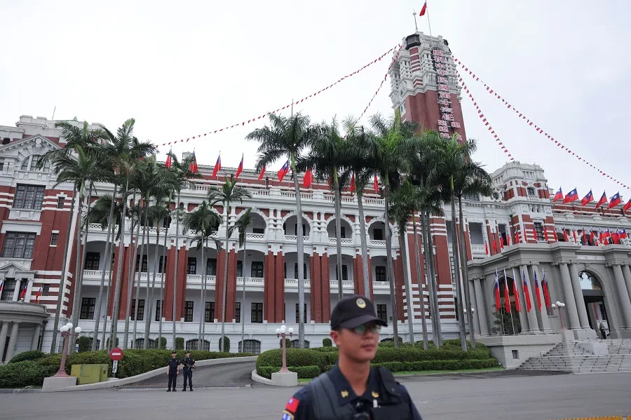Security guards stand guard in front of the Presidential Office Building in Taipei, Taiwan, on 23 May 2024. (Annabelle Chih/Reuters)