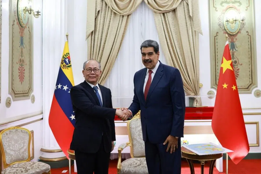 Venezuela’s President Nicolás Maduro and Special Representative of the Chinese Government on Latin American Affairs Qiu Xiaoqi meet at the Miraflores Palace, in Caracas, Venezuela, on  2 January 2026. (Marcelo Garcia/Miraflores Palace/Handout via Reuters)