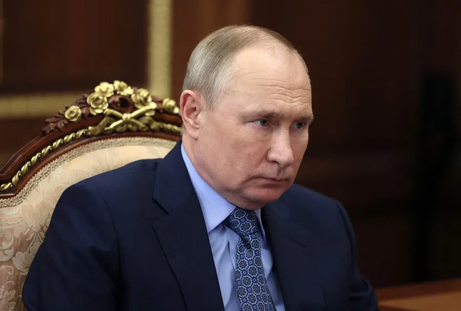 In this file photo taken on 30 March 2022, Russian President Vladimir Putin meets with Ingushetia's regional head at the Kremlin in Moscow, Russia. (Mikhail Klimentyev/SPUTNIK/AFP)