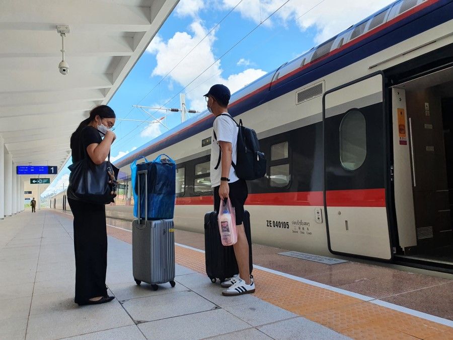 Passengers alight from the train at Boten train station along Laos-China Railway. (SPH Media)