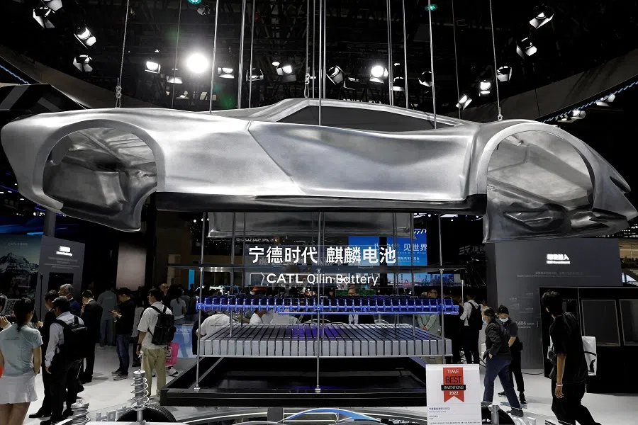 People visit the booth of battery manufacturer CATL, at the Beijing International Automotive Exhibition in Beijing, China, 25 April 2024. (Tingshu Wang/Reuters)