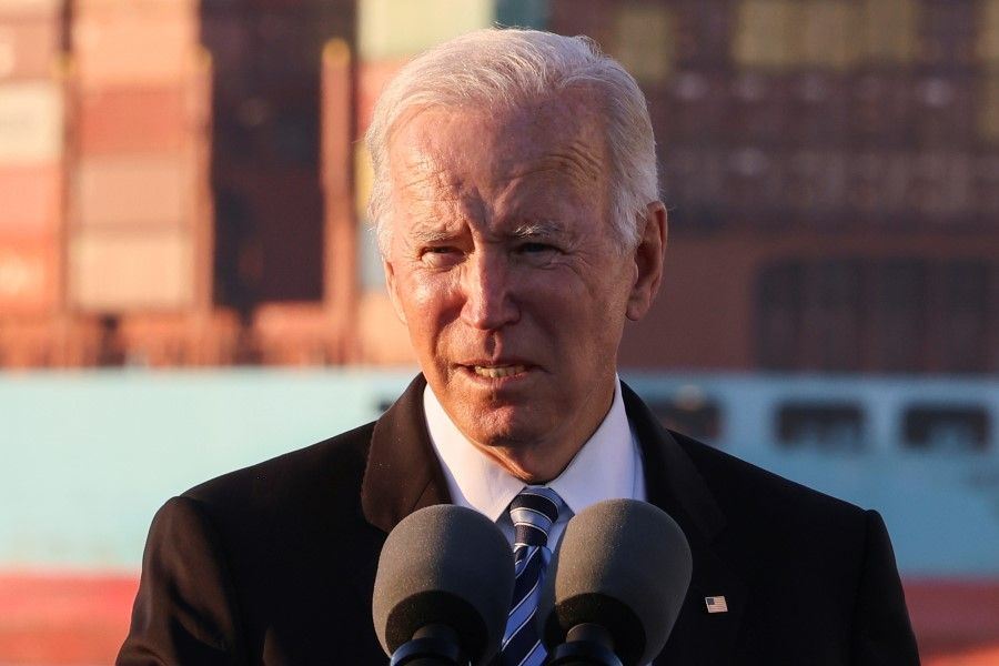 US President Joe Biden delivers a speech during a visit to the Port of Baltimore, Maryland, US, 10 November 2021. (Evelyn Hockstein/Reuters)