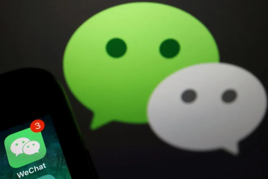The messenger app WeChat is seen next to its logo in this illustration picture taken 7 August 2020. (Florence Lo/Illustration/File Photo/Reuters)