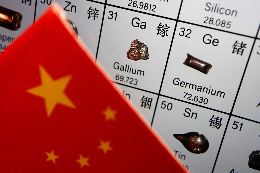 The flag of China is placed next to the elements of gallium and germanium on a periodic table, in this illustration picture taken on 6 July 2023. 