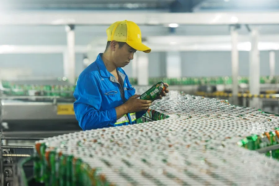 A beer factory in Hangzhou. China's economy expanded at its slowest rate in nearly three decades in the third quarter, hit by cooling domestic demand and a protracted US trade war. (STR/AFP)