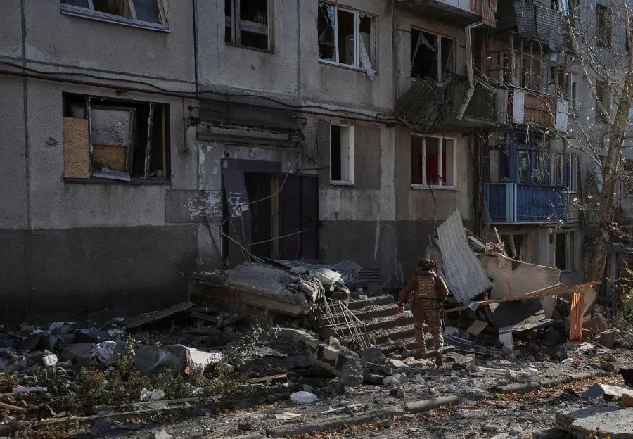 A member of the White Angel unit of Ukrainian police, which evacuates people from the frontline towns and villages, checks an area for residents, amid Russia’s attack on Ukraine, in the frontline town of Kostiantynivka in Donetsk region, Ukraine, 3 November 2025. (Anatolii Stepanov/Reuters)