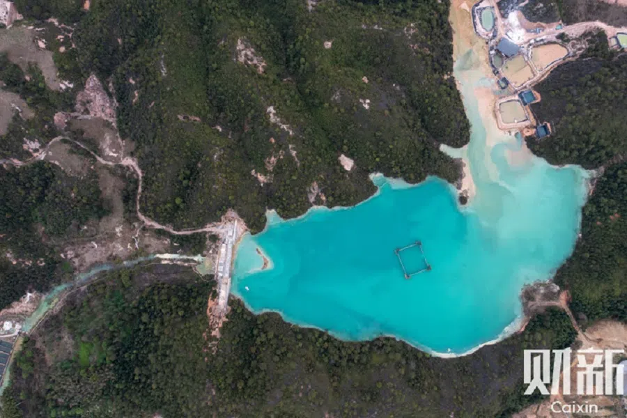 Acidic wastewater from rare earth mines flows into reservoirs in Ganzhou, China, in March 2022. (Ding Gang/Caixin)