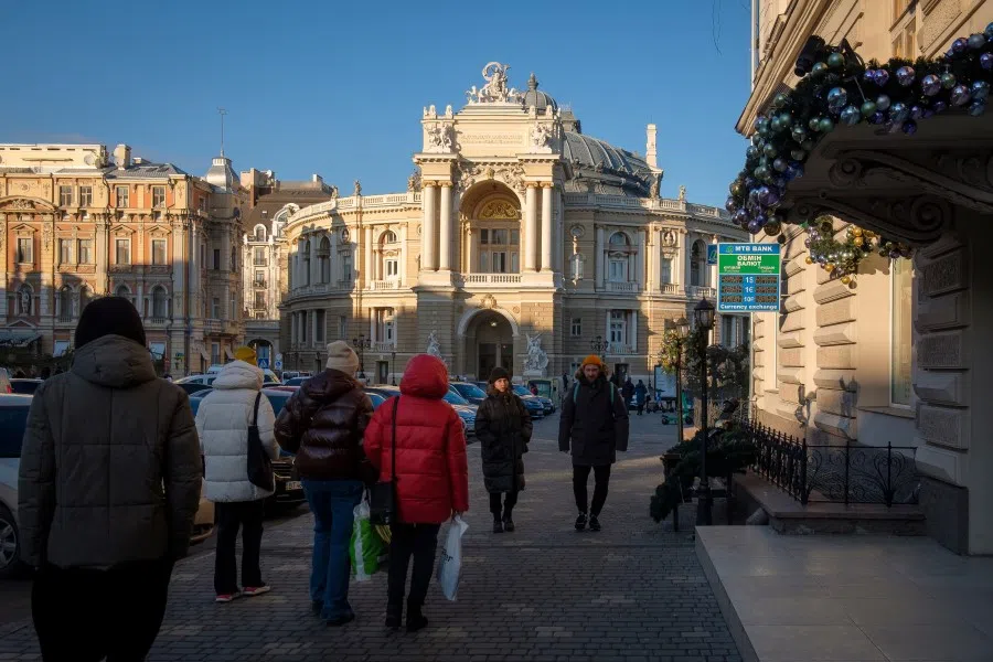 Pedestrians in Odessa, Ukraine, on 22 January 2022. Russia's troop buildup on the Ukraine border is now being cited by strategists as one of the main threats to global markets, even though President Vladimir Putin has repeatedly said he currently has no plans to attack. (Christopher Occhicone/Bloomberg)