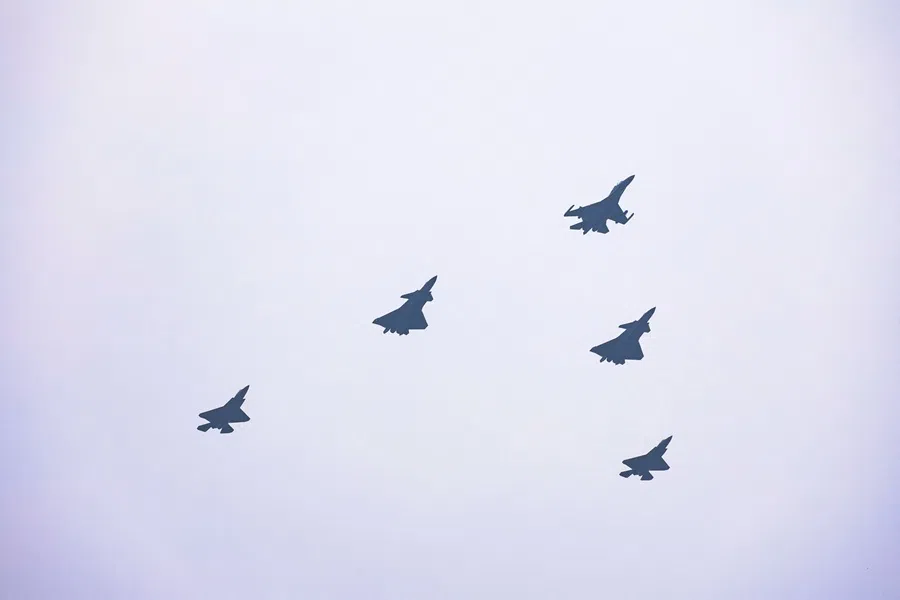 J-16D, J-20, and J-35A fighter jets fly over Tiananmen Square during a military parade to mark the 80th anniversary of the end of World War Two, in Beijing, China, 3 September 2025. (Tingshu Wang/Reuters)