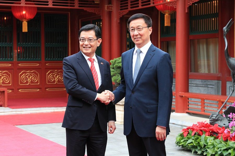 Singapore's Deputy Prime Minister Heng Swee Keat (left) with Chinese Vice-Premier Han Zheng at the Diaoyutai State Guesthouse in Beijing, China, on 22 May 2019, at the start of his week-long visit to China. (Ministry of Communications and Information)