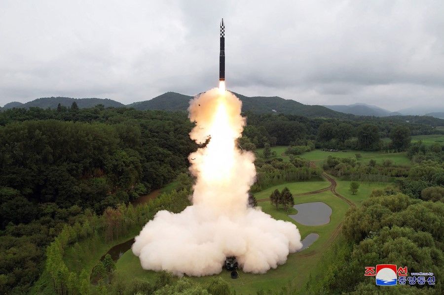 This picture taken on 12 July 2023 and released by North Korea's official Korean Central News Agency (KCNA) on 13 July 2023 shows the test firing of a new intercontinental ballistic missile (ICBM) "Hwasong-18" at an undisclosed location in North Korea. (KCNA via KNS/AFP)