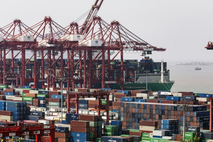 Gantry cranes and containers at the Yangshan Deepwater Port in Shanghai, China, on 5 July 2022. (Qilai Shen/Bloomberg)