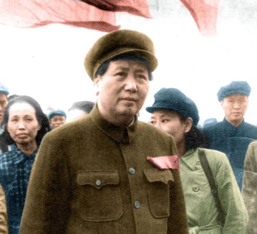 On 1 October 1949, the ceremony of the founding of the People's Republic of China was held in Beijing, led by Chairman Mao Zedong. In the background is Xie Xuehong (first from left), the leader of the protest against Taiwan's KMT government (known as the 228 incident), who ascended Tiananmen Tower with Chairman Mao. The Chinese Communist Party categorised the 228 incident as part of the fight to liberate the people of China.