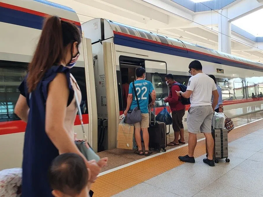 Passengers boarding the China-Laos Railway train at Vientiane station.