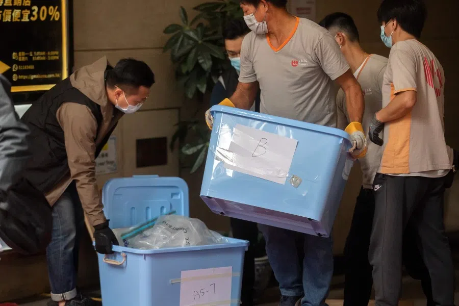 Boxes of evidence are loaded onto a truck from the offices of online media outlet Stand News during a police raid in Hong Kong, China, on 29 December 2021. (Paul Yeung/Bloomberg)
