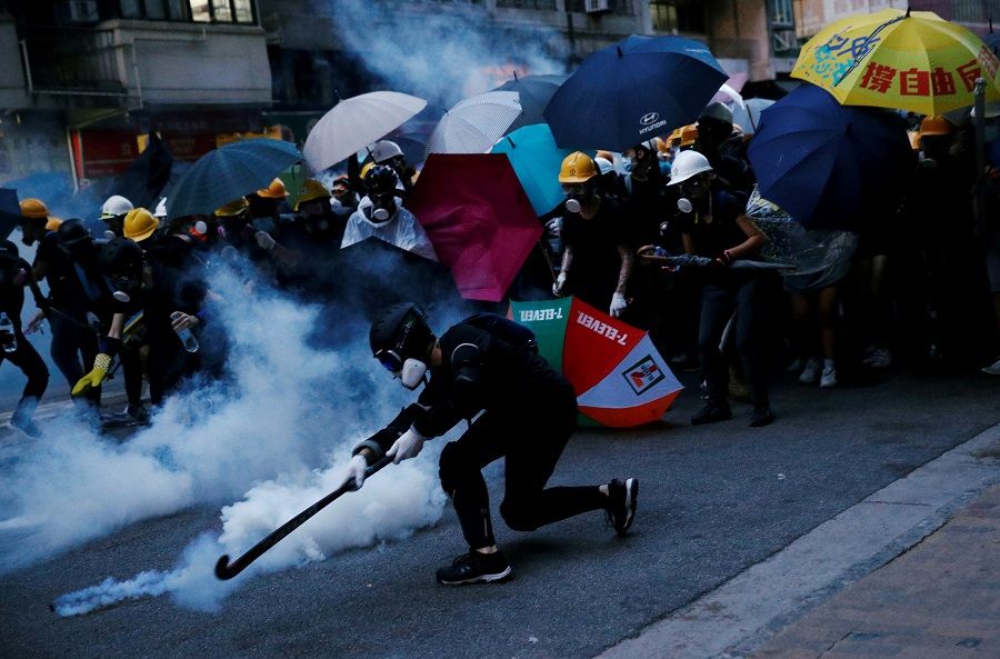 Demonstrators clash with police during a protest against police violence during previous marches, near China's Liaison Office in Hong Kong, on 28 July 2019. (Edgar Su/File Photo/Reuters)