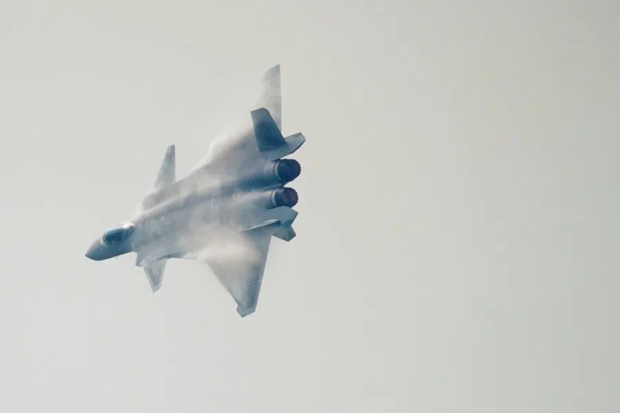 A J-20 stealth fighter jet of the Chinese People's Liberation Army (PLA) Air Force performs at Airshow China, in Zhuhai, Guangdong province, China, 28 September 2021. (Aly Song/Reuters)