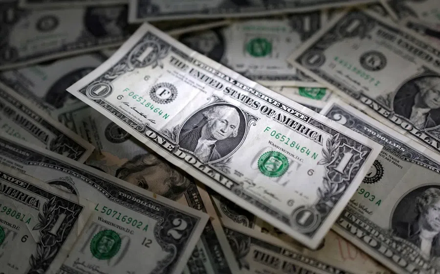 US dollar banknotes are seen in this illustration taken 10 March 2023. (Dado Ruvic/Reuters)