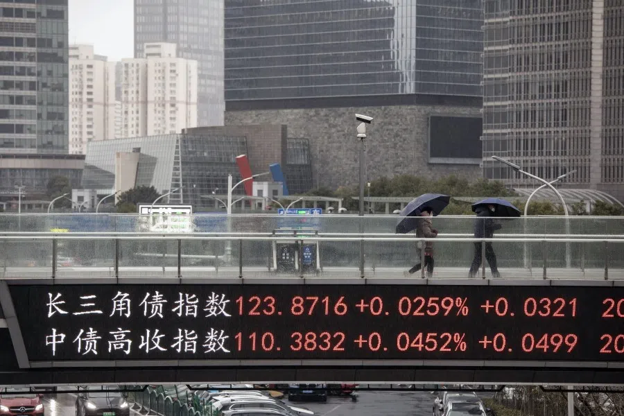 An electronic ticker displays stock figures in Pudong's Lujiazui Financial District in Shanghai, China, on 7 February 2022. (Qilai Shen/Bloomberg)