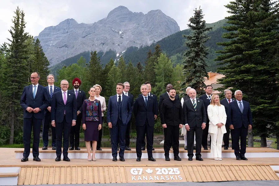 (left to right, top row) Group of Seven (G7) leaders and attendees pose for a family photo during the G7 summit at the Kananaskis Country Golf Course in Kananaskis, Alberta, Canada, on 17 June 2025.